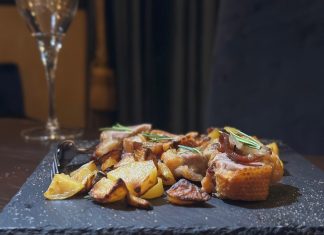 Maialino in crosta con patate © Fermata Spettacolo
